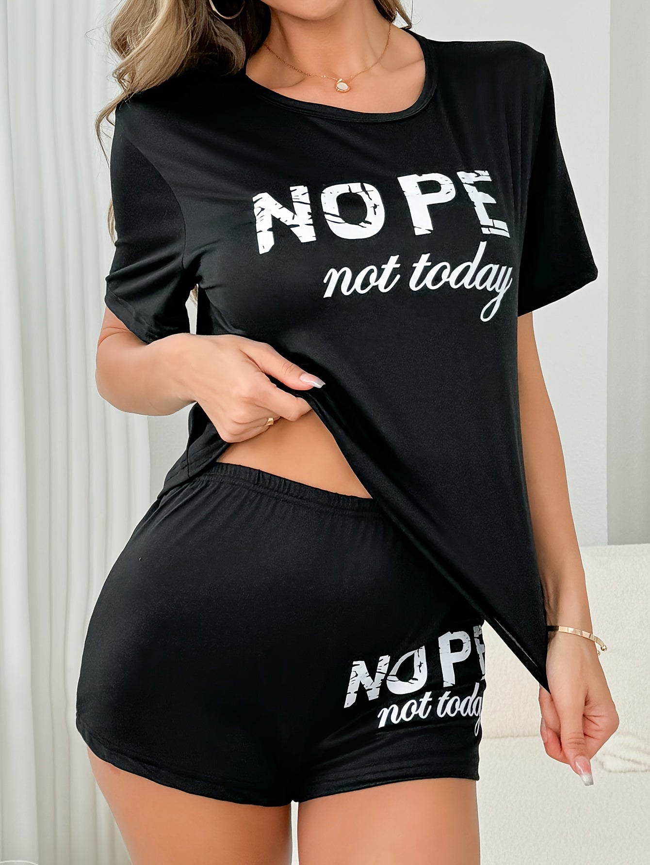 Women's casual pajama set with "NOPE not today" print, including short sleeve t-shirt and shorts. Comfortable loungewear for sleeping or lounging.