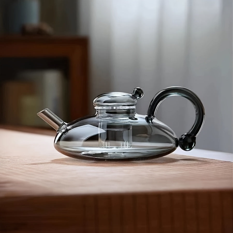 High Borosilicate Heat-Resistant Glass Teapot perfect for brewing tea on open flames and electric ceramic stoves, ideal for gifting to a loved one.