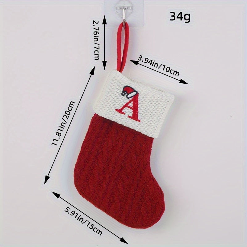 Knitted letter Christmas socks for home tree ornaments; red socks in gift bag for festive attire.