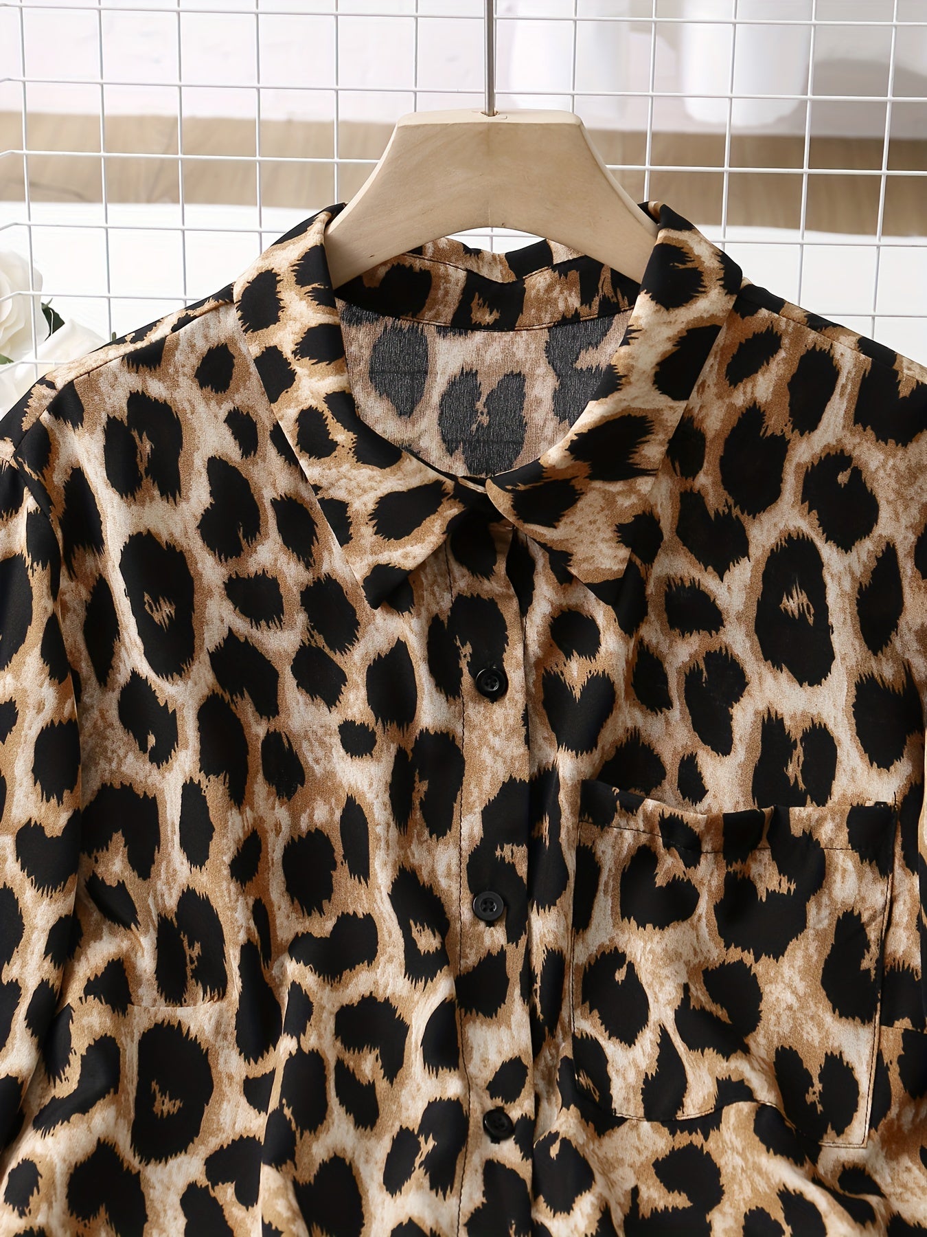 Leopard print button-up shirt dress with rolled sleeves, ideal for spring and autumn.