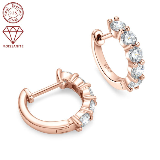 These women's fashion earrings feature a classic daily style, crafted with 925 silver and set with 10 pieces of 3.5mm moissanite stones, each weighing 1.0ct. The total weight of the earrings is 3.39g. These round synthetic moissanite earrings are a