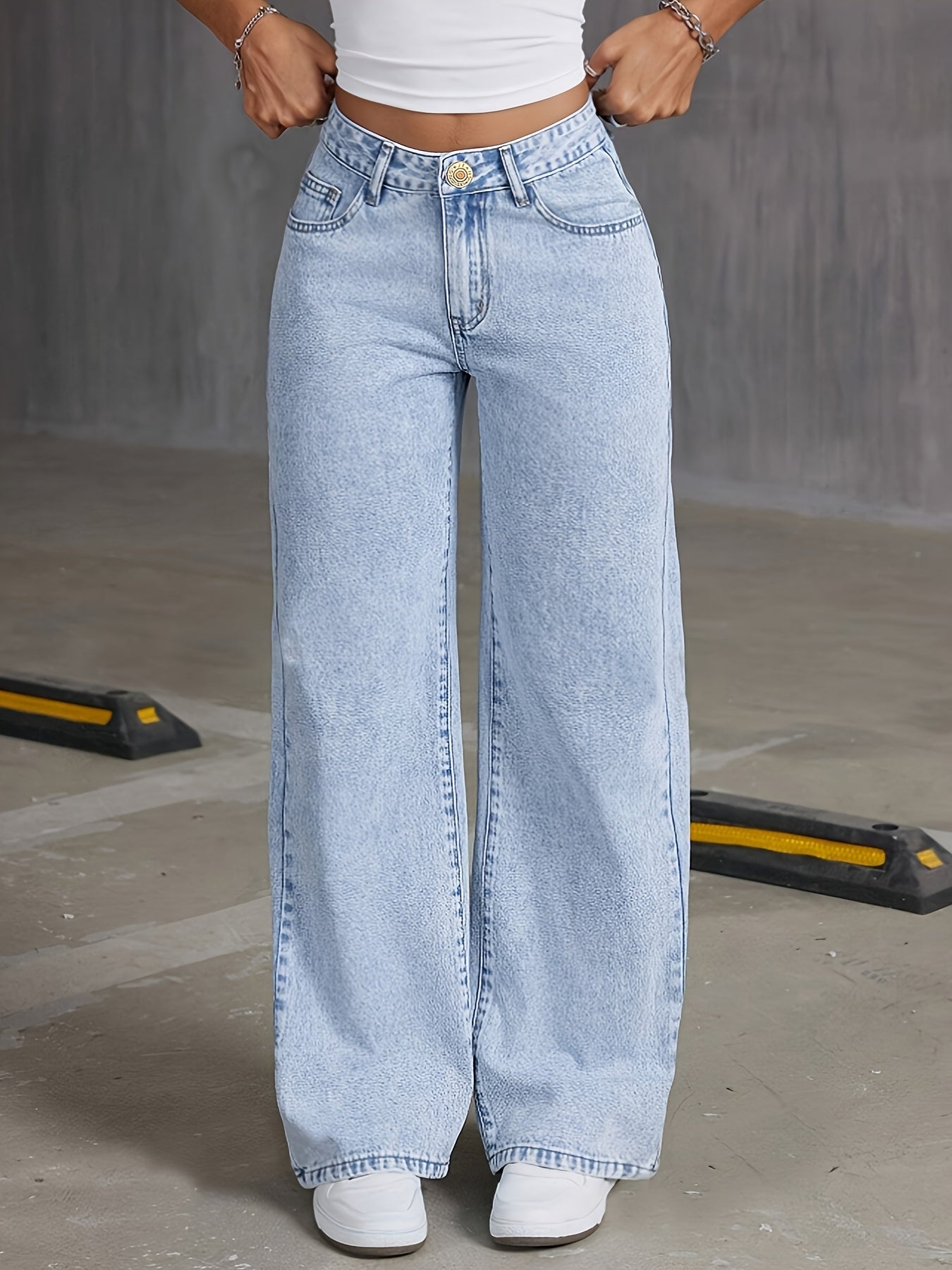 Preppy style high-waisted wide leg denim jeans for women, with button detail and solid color, perfect for all-season weekend wear.