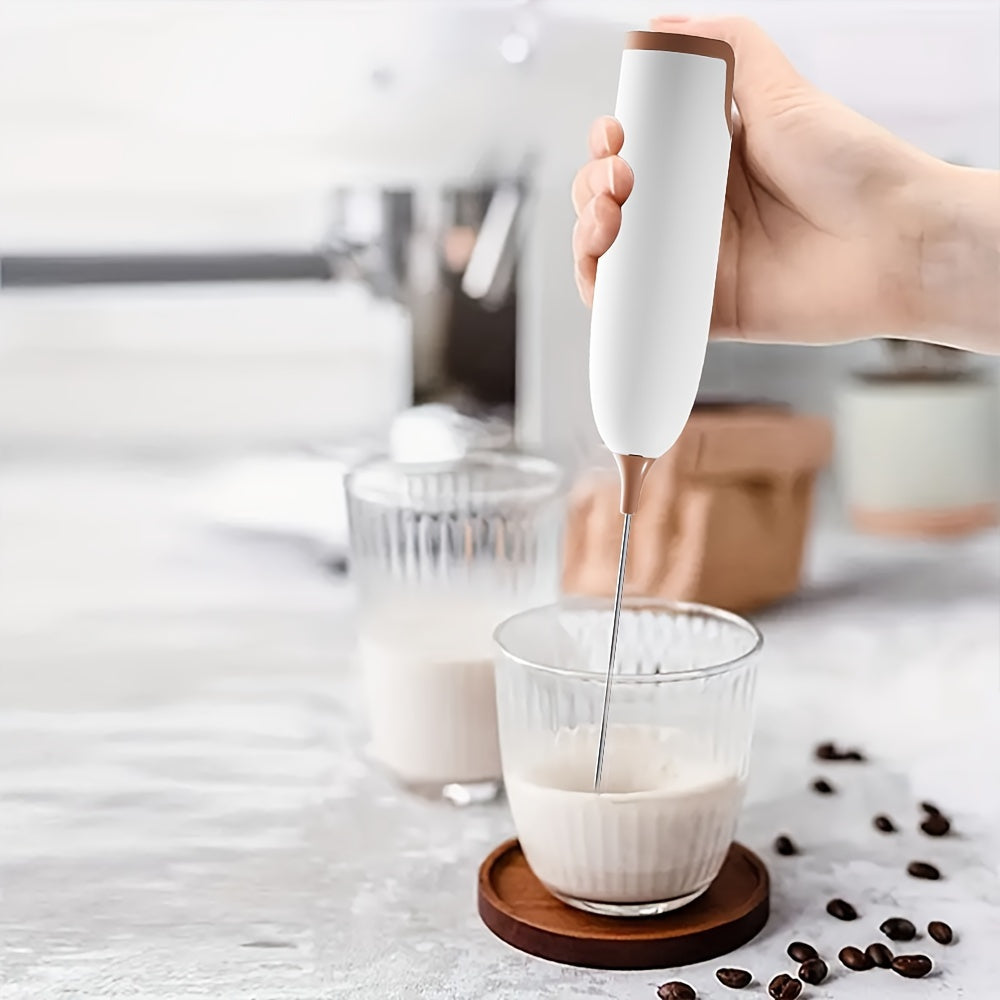 Compact and high-powered electric milk frother for on-the-go use. Operated by batteries, this stainless steel beverage mixer is perfect for creating frothy drinks such as coffee. (AA Batteries not included)