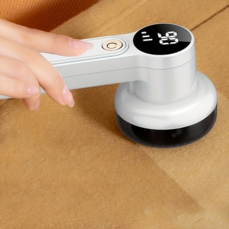 Lint remover with USB rechargeable battery, LED display, and 2 speeds for clothing and furniture.