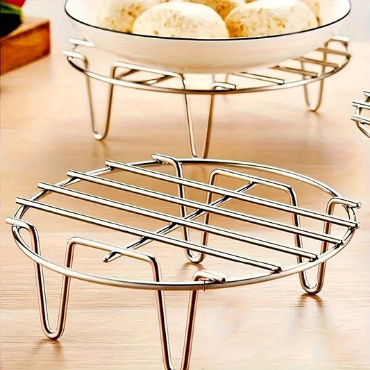 Two pieces of stainless steel steamer racks with an elevated 4-corner design, perfect for healthy cooking and essential kitchen accessories.