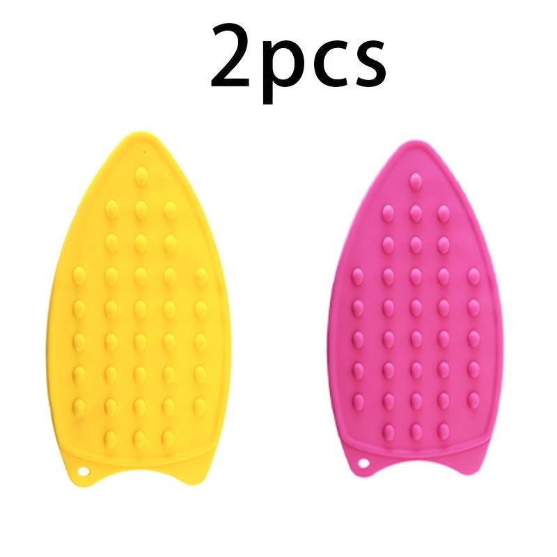 Get 2 premium silicone ironing mats, each measuring 26.67cm thick. These foldable, solid color pads are heat-resistant and feature a textured surface for safe and easy ironing. A must-have for home laundry essentials.