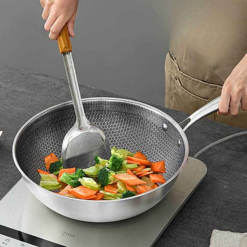 A must-have for home cooking, this high-quality stainless steel wok features a unique honeycomb design that is uncoated and non-stick. Perfect for use on gas stoves, induction cookers, and more, this versatile wok is lightweight and ensures a minimal