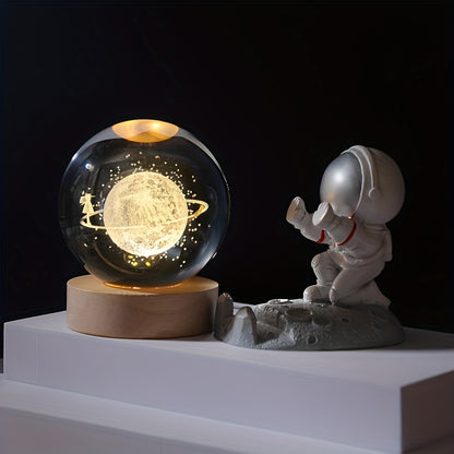 This 3D laser-engraved crystal ball night light features the Solar System with a focus on Saturn. It is USB powered and makes a perfect gift for any occasion.