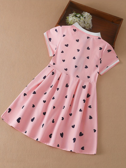 Girls' summer cotton blend dress with heart pattern, short sleeves & knee-length - perfect for performances & school events.