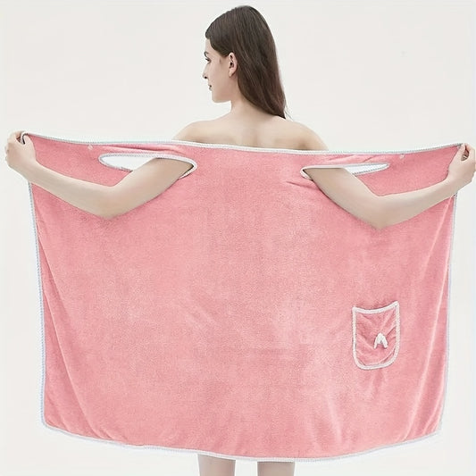 Soft coral velvet wearable bath towel with bow detail, ideal for bathroom and beach use. Thich, absorbent, quick-dry, pink with white border. Durable woven texture. Perfect for everyday comfort.