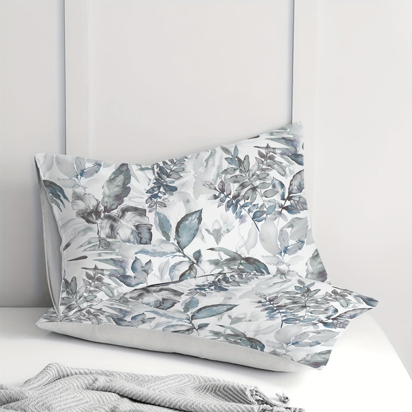 Leaf pattern brushed printed pillowcases, set of 2. Made from soft and breathable materials, perfect for enhancing the decor of your bedroom sofa or home. Pillow cores not included.