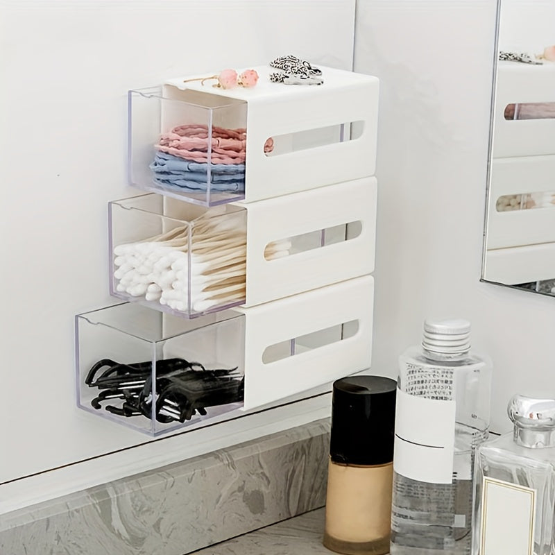 Versatile wall-mounted storage organizer with drawer for bathroom, office, and dorm. No-drill flip design for cosmetics and hair accessories.