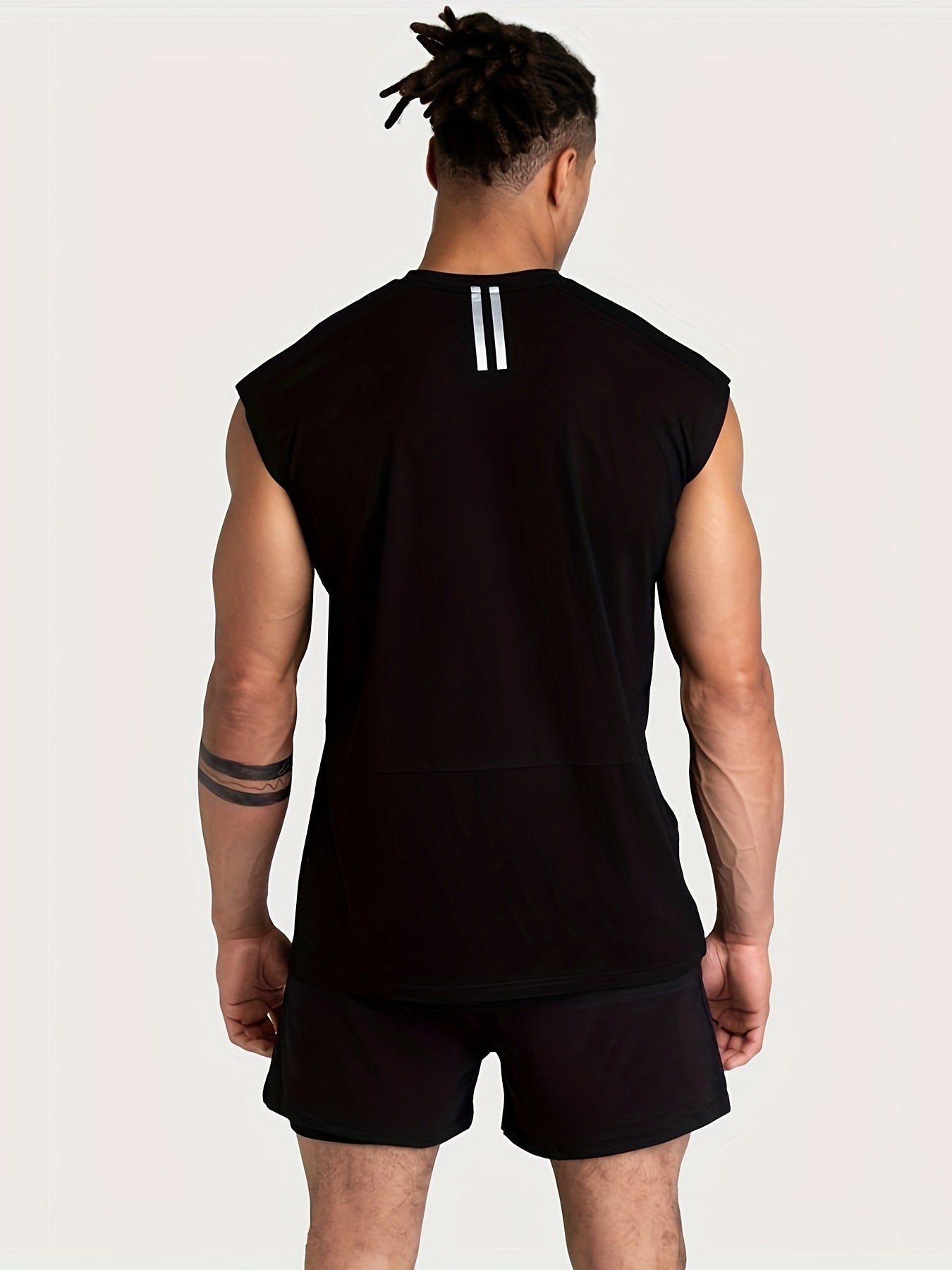 Men's sleeveless cotton blend tank top for gym workouts and summer training.