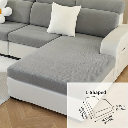 Jacquard sofa slipcover with universal fit and elastic design for furniture protection and home decor in any room.