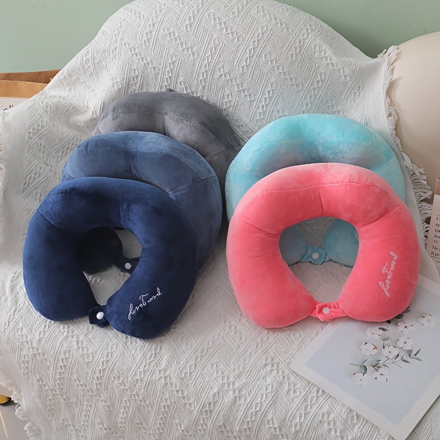 Soft and portable travel pillow in U shape, perfect for neck support on planes, trains, and cars. Ideal for a comfortable rest while traveling.