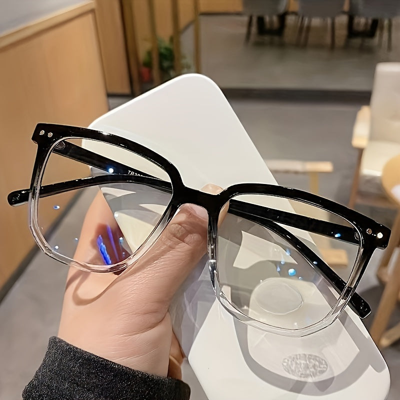 Vision Comfort's Cyberpunk-inspired Square Blue Light Blocking Glasses feature an oval full frame and lightweight PC material for use with computers, TVs, and phones.