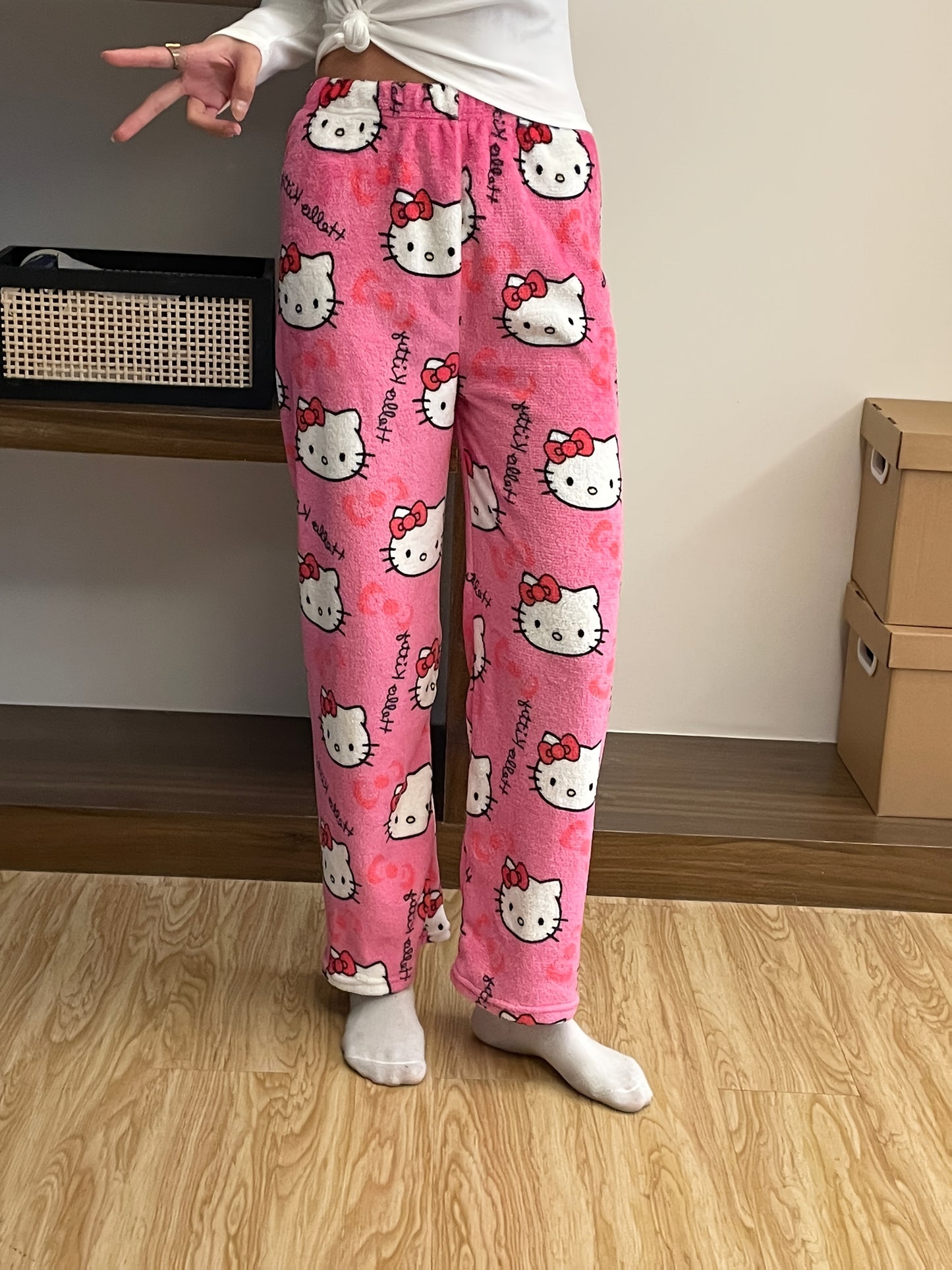 Sanrio Hello Kitty cozy flannel pajamas for women, officially licensed and perfect for relaxing and sleepwear.