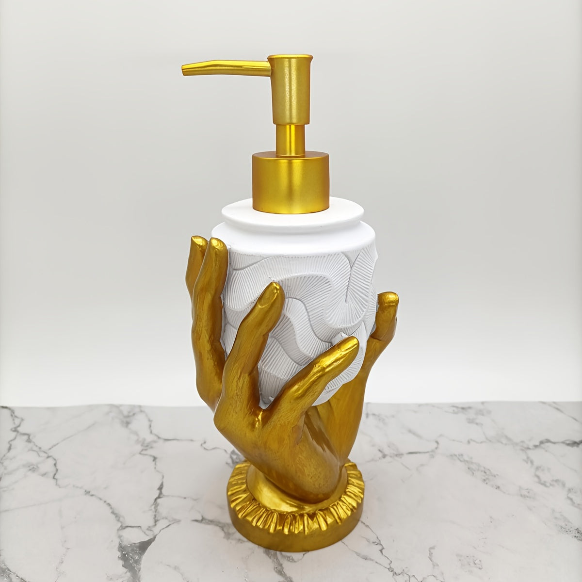 Elegant gold fingerprint resin soap dispenser, mercury-free with textured design. Ideal for bathroom and kitchen decor. Made of resin.