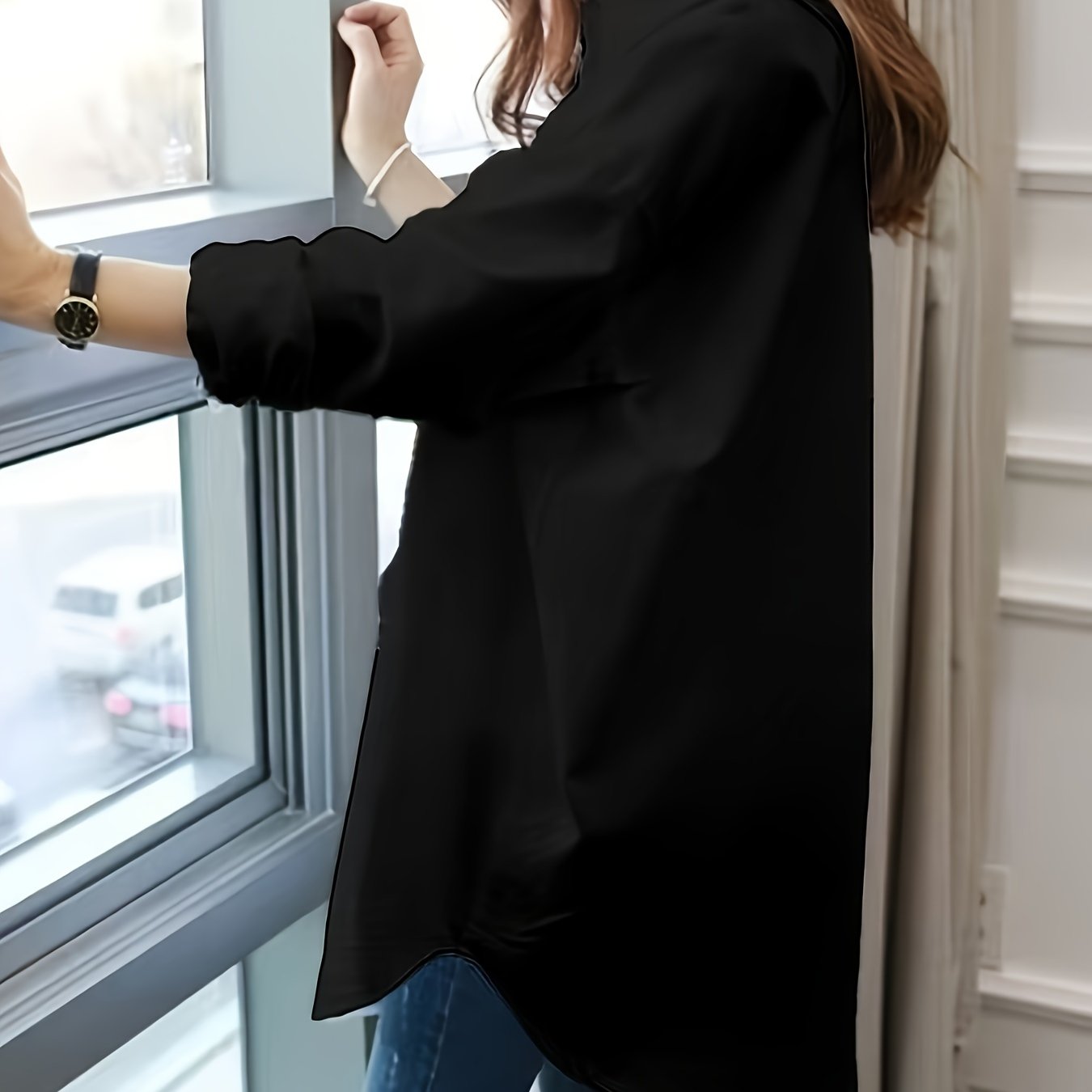 Stylish women's blouse with long sleeves, lapel collar, button detail, mermaid hem, and loose fit for all seasons.