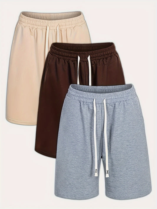 Men's Solid Color Drawstring Shorts in beige, brown, and gray, made of comfortable polyester with an elastic waistband and pockets. Available in plus sizes for summer wear.