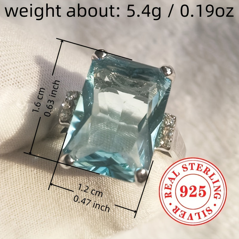 Simple yet elegant, this classic 1 Lady Anniversary Ring features a 5.4g S925 Sterling Silver band with a 4 prong-set square Aquamarine synthetic gemstone. Perfect for everyday casual wear or special occasions like weddings, banquets, and parties, this