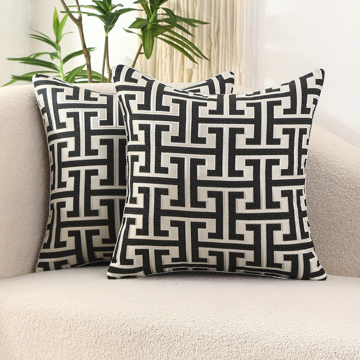 2 modern geometric jacquard pillow covers with invisible zippers, ideal for living room and bedroom decor.