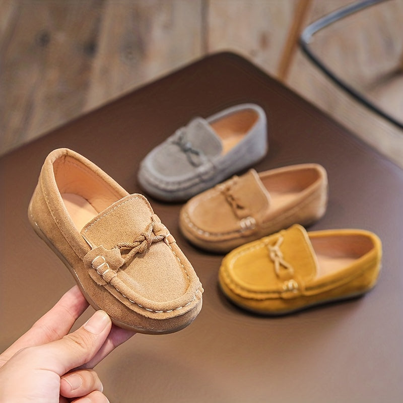 Kids slip-on loafers with soft upper, non-slip sole, breathable lining, bowknot detail, ideal for casual walking indoors and outdoors.