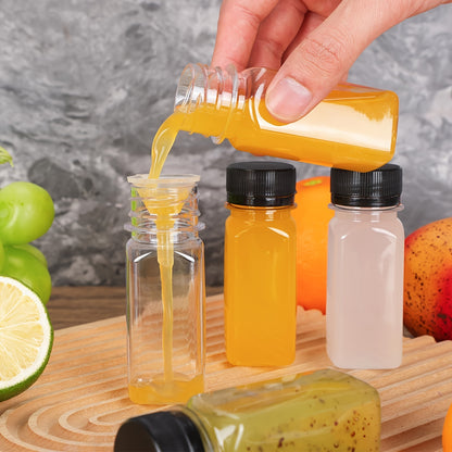 Leakproof 2oz mini shot bottles with screw caps made from food-grade plastic. Ideal for juice and wellness shots. Freezer safe and BPA-free.