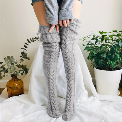 Warm thigh-high knitted socks for women.