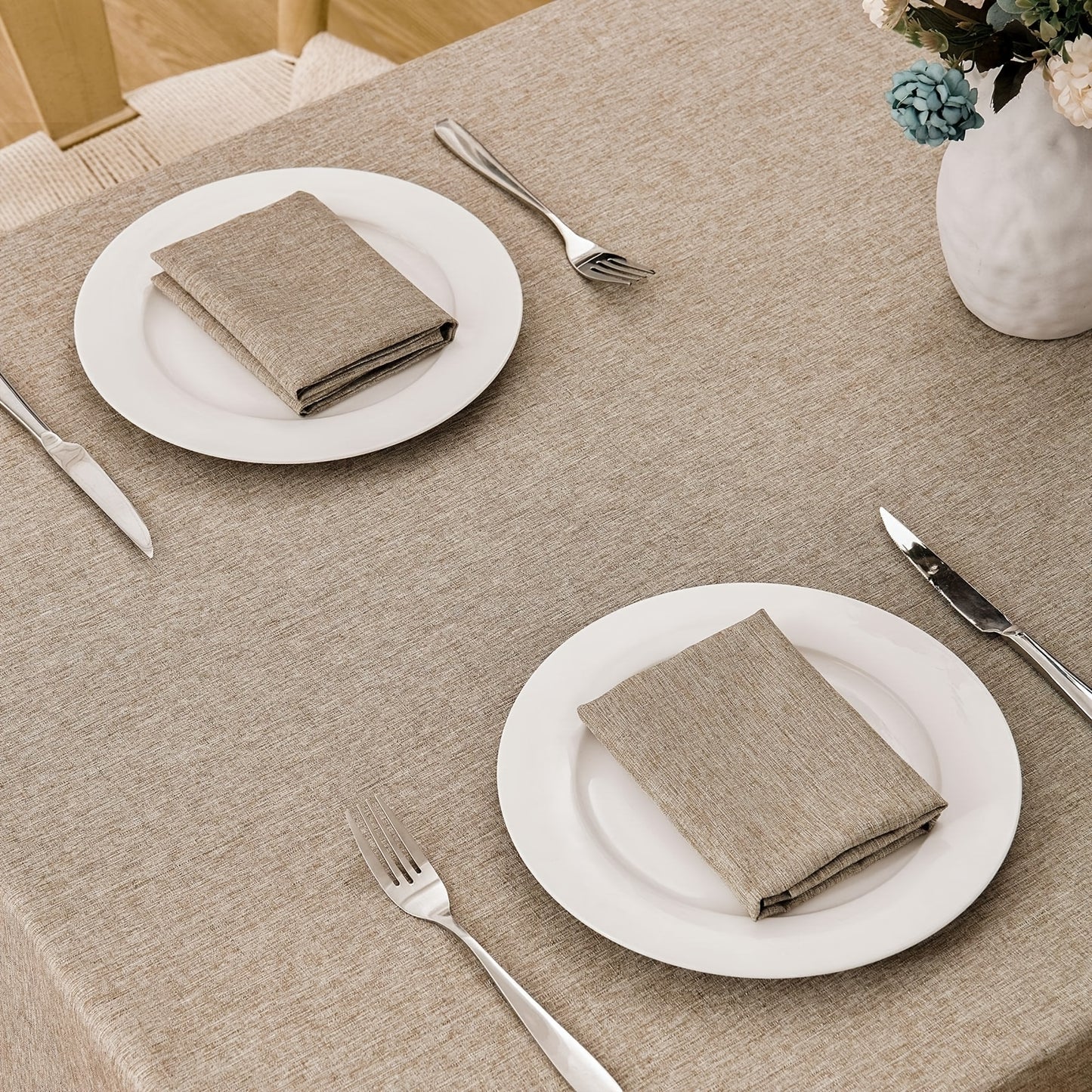 Polyester tablecloth with modern design, ideal for dining room décor.