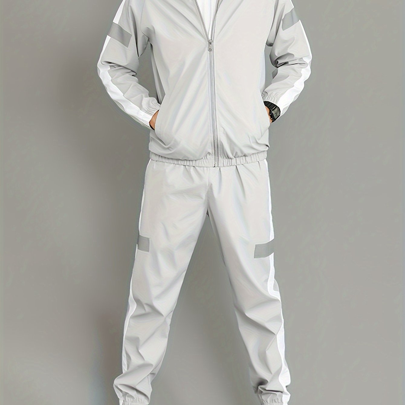 Stylish men's casual set with jacket and loose pants, ideal for spring and autumn activities.