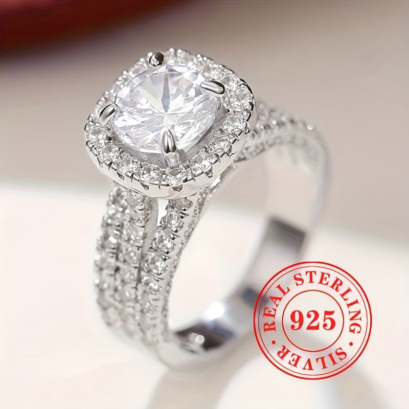 This elegant engagement ring features a timeless 4-prong setting with sparkling zirconia stones, crafted from 7.3 grams of pure S925 silver. Ideal for a romantic wedding banquet, this high-end ring is a stunning piece of jewelry for any lady.