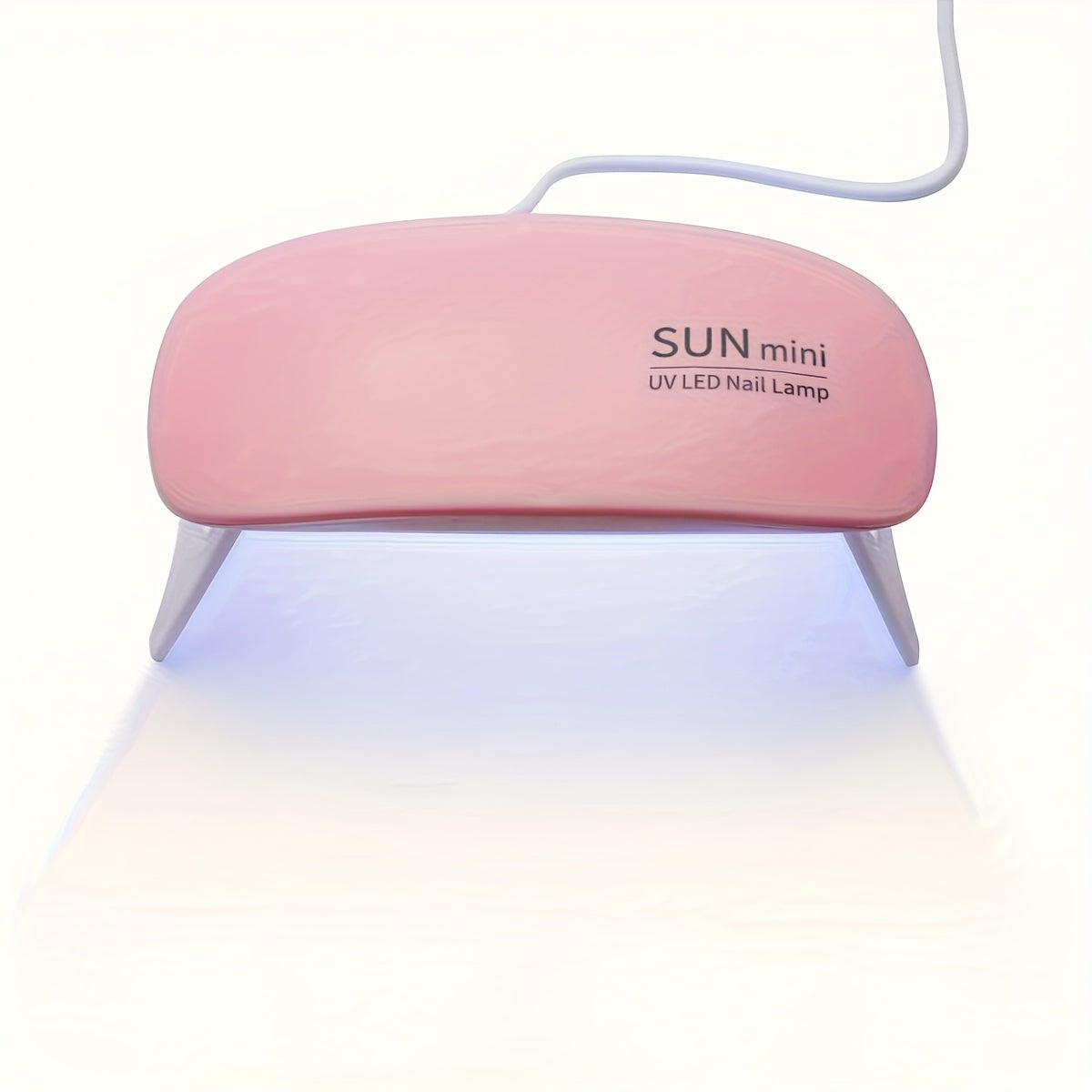 Portable mini nail lamp with 6 UV/LED light beads in pink and white. USB powered, foldable design, suitable for gel polishing and drying. Ideal for hand, foot, and nail care.