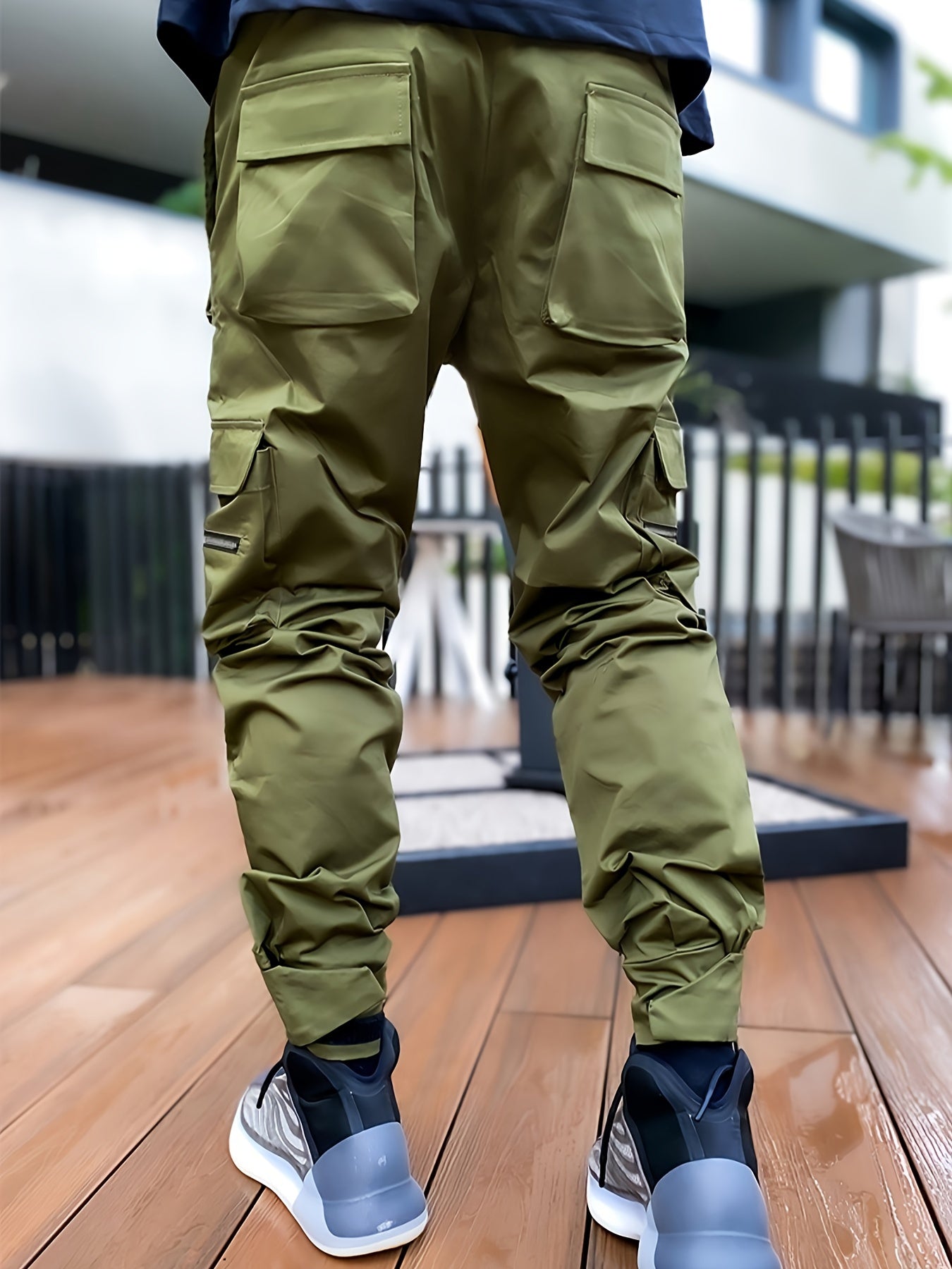 Men's loose straight cargo pants with multi pockets and reflective trend accents.