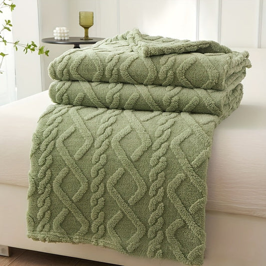 One piece of a luxurious coral fleece throw blanket featuring a geometric pattern in lamb fleece plush fabric. This ultra-soft and cozy blanket is perfect for all seasons and is made with non-woven fabric craftsmanship. It provides lightweight warmth