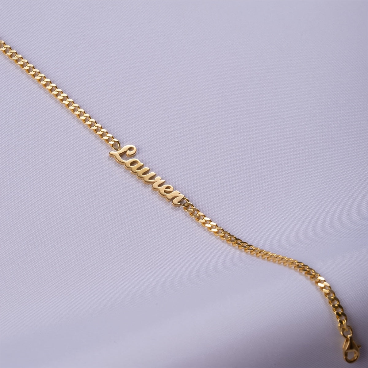 Give the perfect gift of elegance with this customizable bracelet made from 18K gold-plated stainless steel. Featuring a sleek minimalist design crafted with precision through welding and laser cutting, this bracelet is ideal for Valentine's Day or