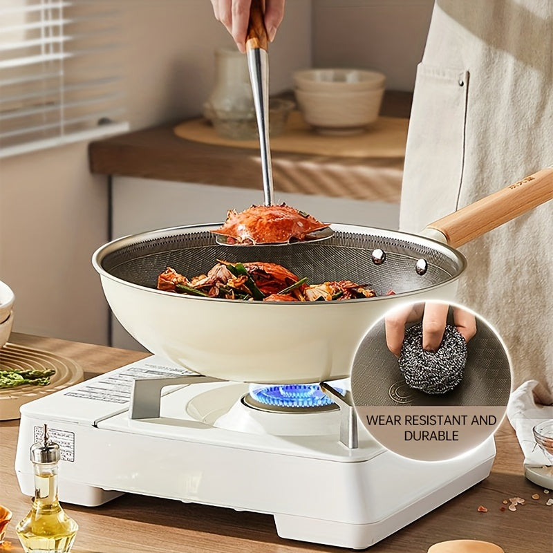 The COOKER KING Chef's Pan is a non-stick wok with a Titanium coating and stainless steel construction for healthy cooking. It features multi-layer construction, no chemical coating, and is PTFE & PFOA free. The pan is also induction compatible and comes