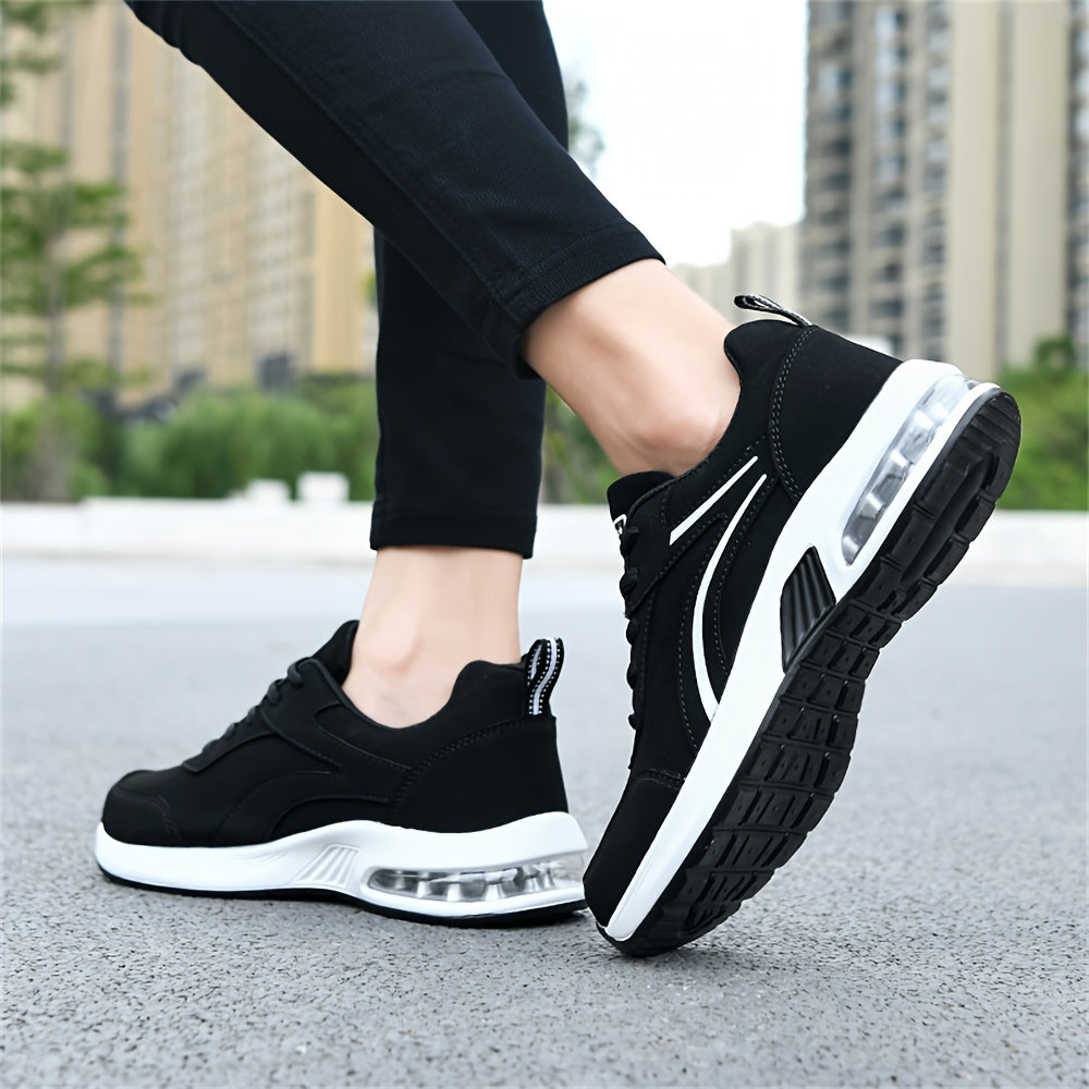 Women's casual sneakers made from black synthetic leather, featuring a lightweight design, air cushion support, lace-up style suitable for work, travel, or sports. Stylish and breathable