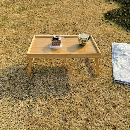 Bamboo folding table with tray, adjustable for bed, sofa, outdoors. Perfect gift for Father's Day and Mother's Day.