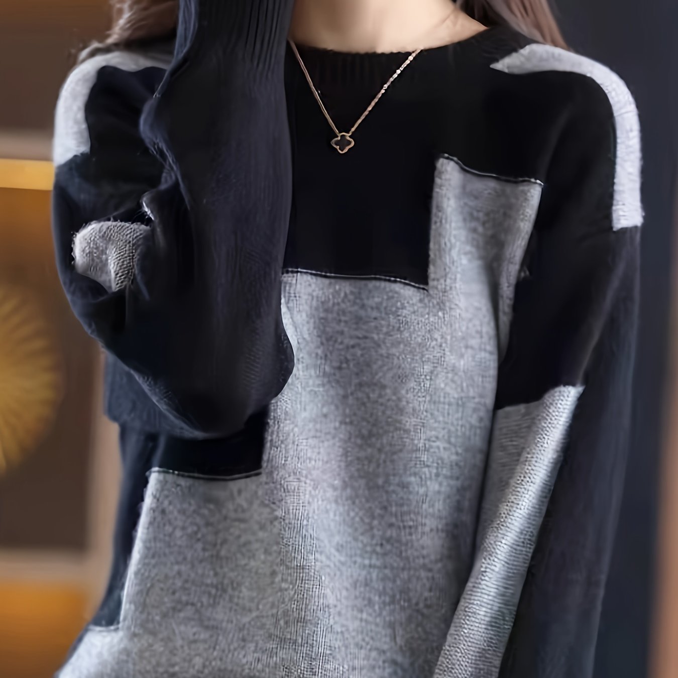 Women's color-blocked round-neck sweater, perfect for autumn and winter.