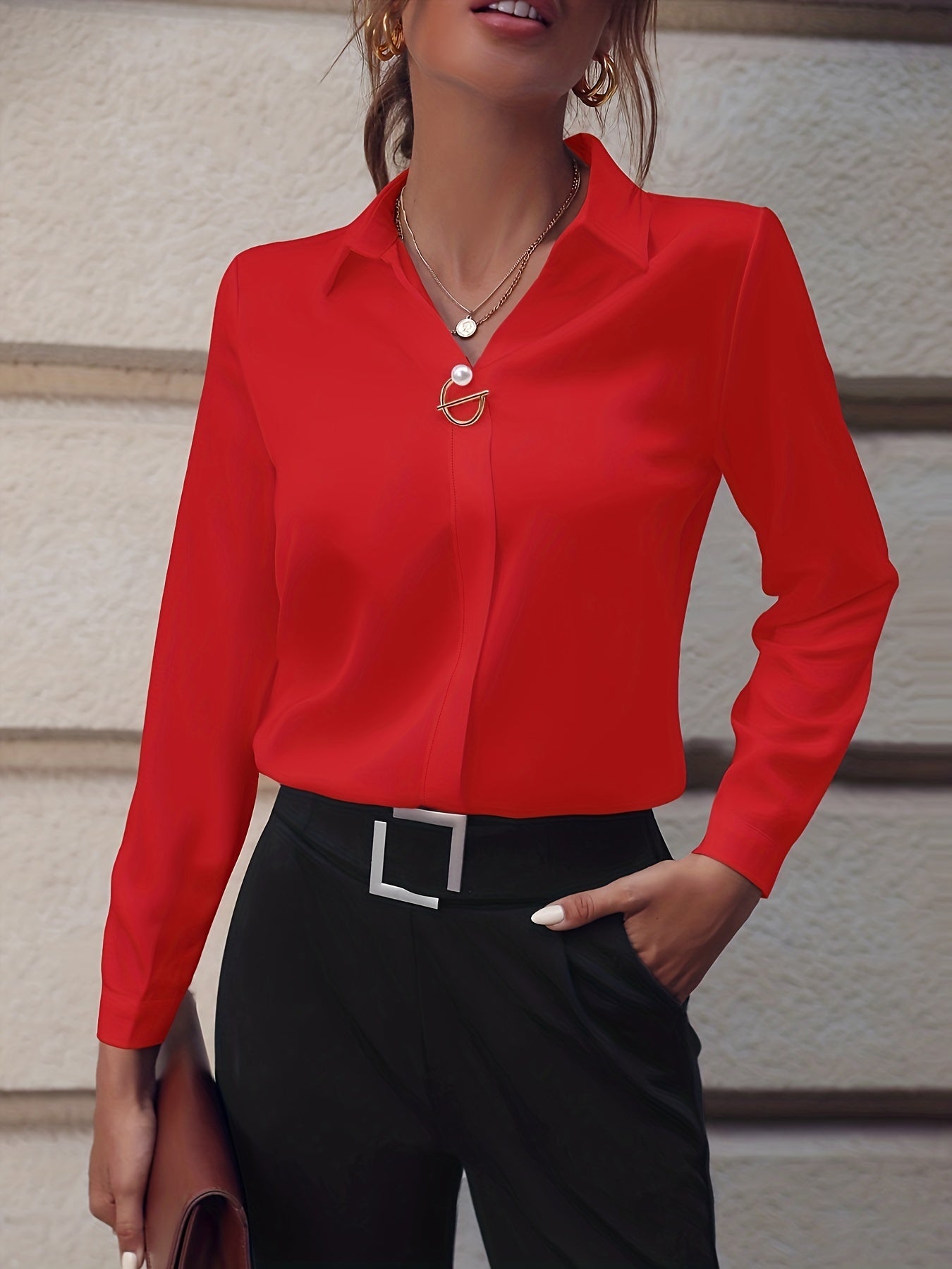 Stylish long-sleeve blouse with pearl buttons - slim fit, solid color for women, ideal for casual or office wear.