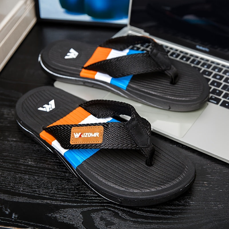 Stylish men's color block flip flops with non-slip rubber sole for indoor activities.