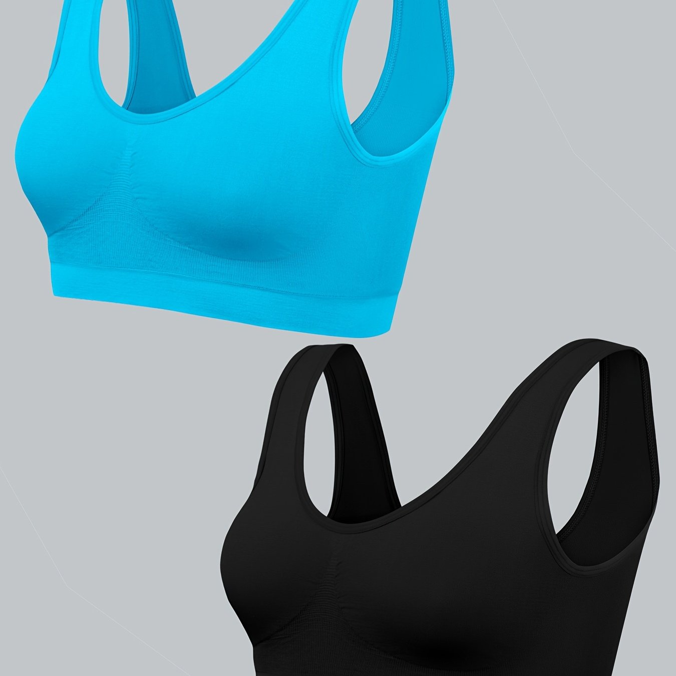 Two women's seamless, high elasticity sports bras made from solid color polyamide knit fabric. Offers high support and does not contain padding. Great for adult athletic activities.