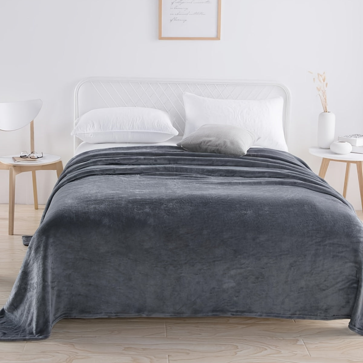 A cozy, grey flannel blanket is the perfect gift for any occasion. This soft and warm throw blanket is ideal for snuggling up on the sofa, staying warm in the office, or keeping cozy on a camping trip. It's a versatile gift that can be used all year