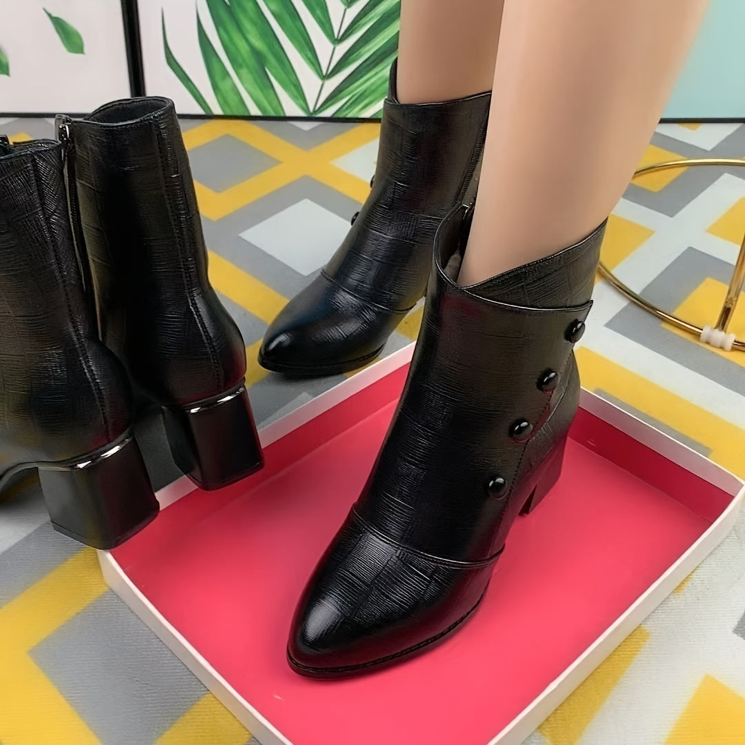 Black synthetic ankle boots lined with fleece for warmth, featuring a chunky heel, pointed toe, side zipper, and designed for cold weather.