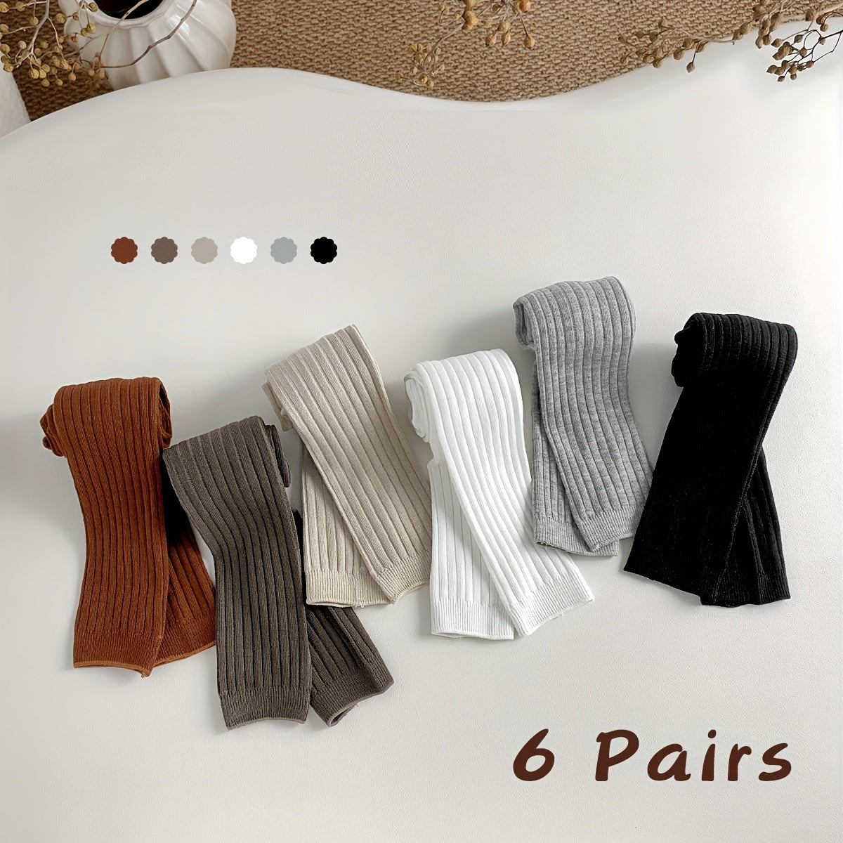 Six pairs of girls' cotton blend tights - hand wash only, skin-friendly and comfortable