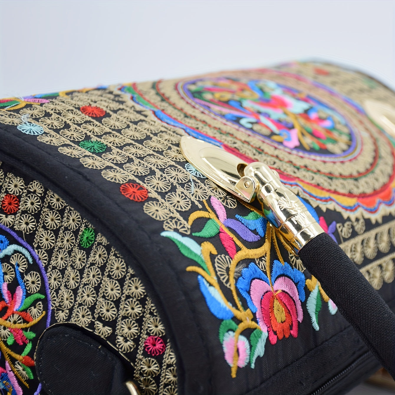 Vintage embroidered Boston bag with retro bohemian tote style for women.