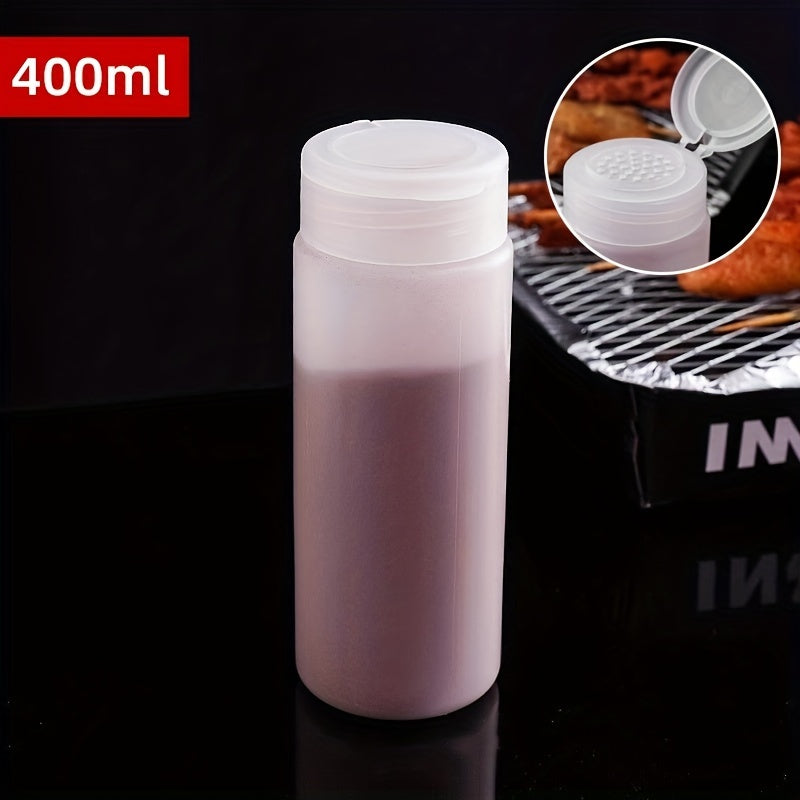 Multi-purpose powder dispenser bottle for various ingredients such as flour, sugar, coffee, BBQ spices, etc. Made of BPA-free plastic, easy to clean, available in 400ml or 600ml sizes, a must-have kitchen gadget.