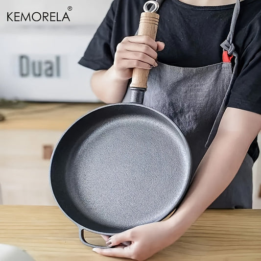 Experience the quality of the KEMORELA Premium Cast Iron Skillet. This uncoated, non-stick cookware is versatile and suitable for gas, electric, and induction stoves. Perfect for cooking steak, omelets, and more, this skillet features wooden anti-scald