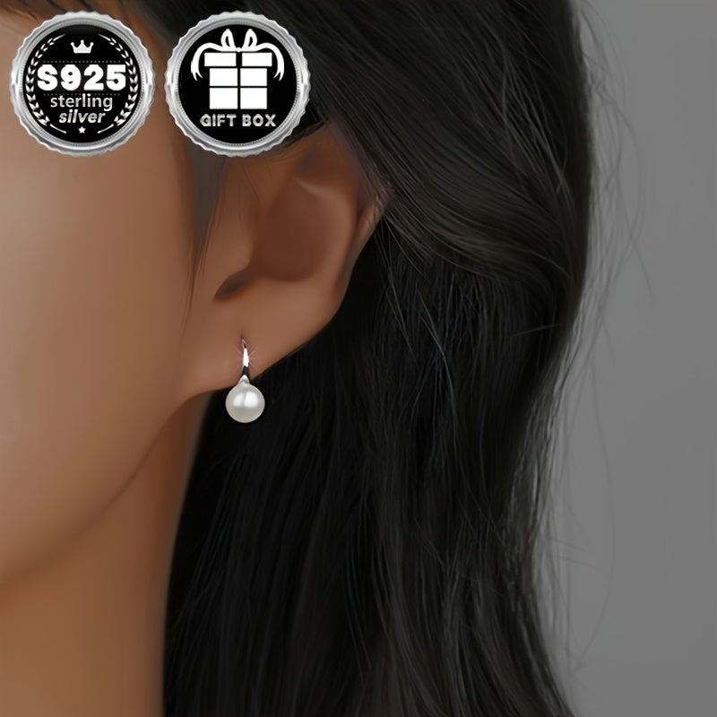 Classy and chic earrings designed for women, showcasing a timeless and minimalist style accented with lovely pearl details. Crafted from 1.55g of high-quality 925 silver, these earrings are perfect for everyday wear, work, special events, and make a